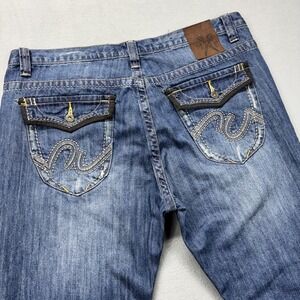 Marc Ecko Cut & Sew Jeans Mens 38x34 Boot cut Distressed blue Denim flap Pockets